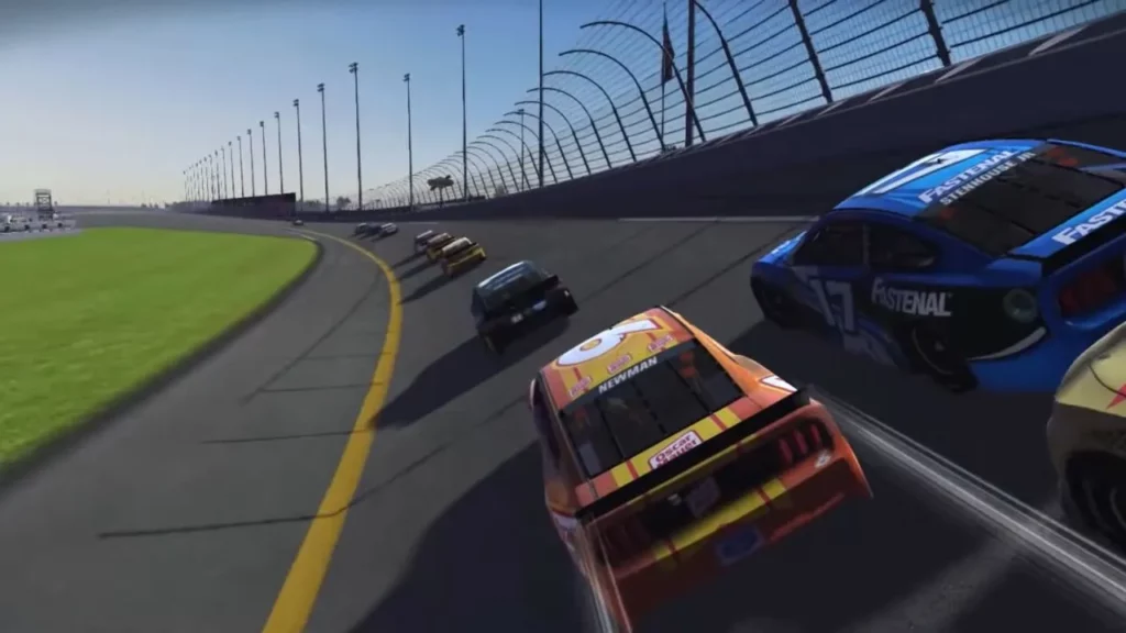 Many cars on a racing track doing race with each other in Nascar Heat Mobile game.
